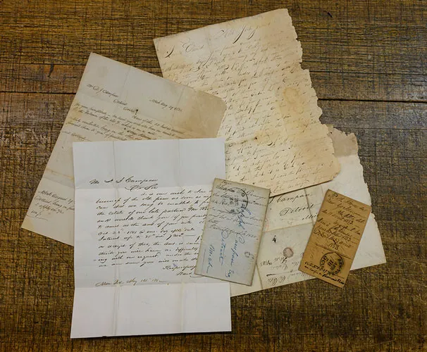 A small grouping of old letters with cursive writing, all belonging to the new Campau collection.