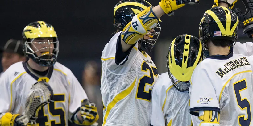 bhl-mens-lacrosse-huddling-together-game-celebration