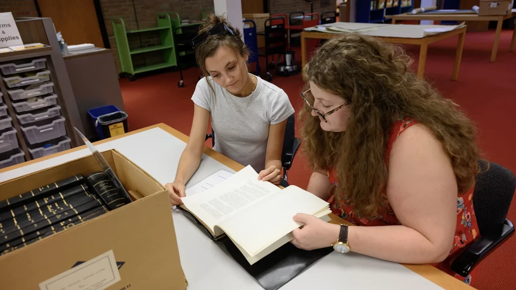 bhl-reading-room-two-staffs-reveiwing