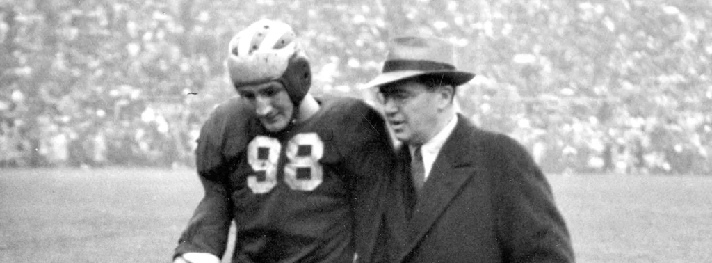 Tom Harmon leaving the field