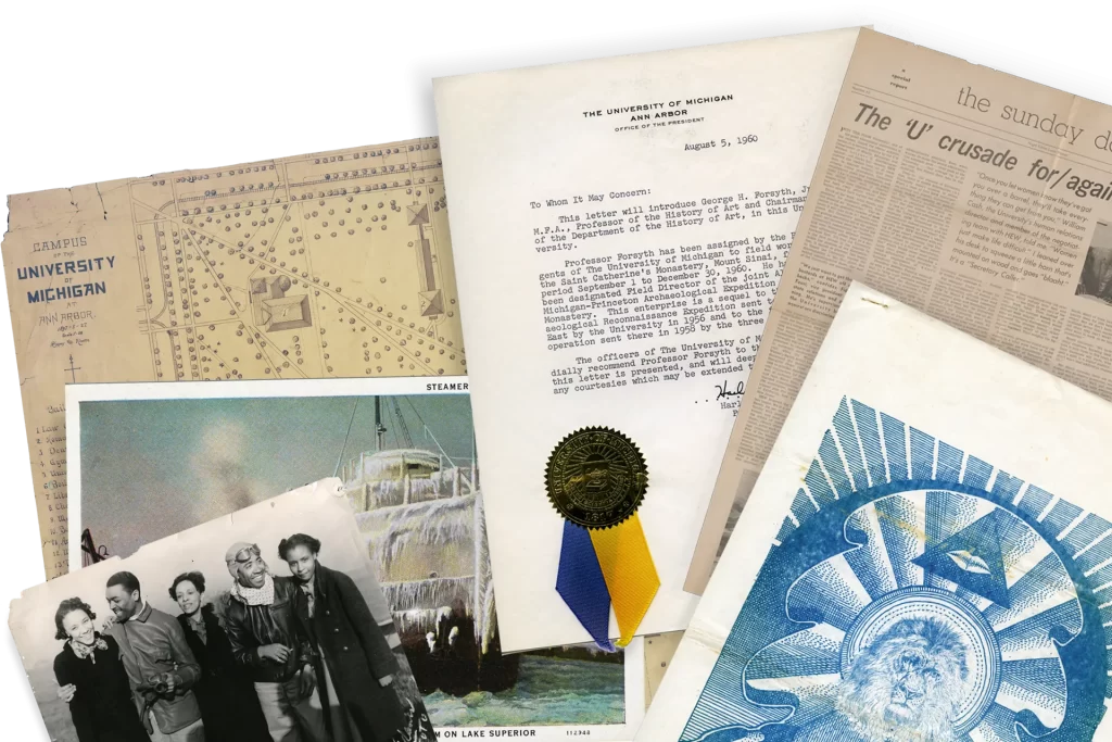 A variety of paper materials from the Bentley archives layered on top of each other including a photograph of early African American pilots, a shipwreck, and a newspaper article.